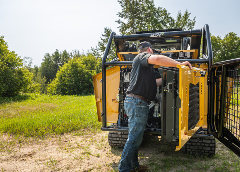 ASV VT-80 Forestry Compact Track Loader being serviced in the field